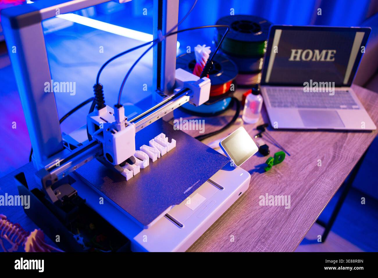 3D Printer Creating Word HOME Stock Photo