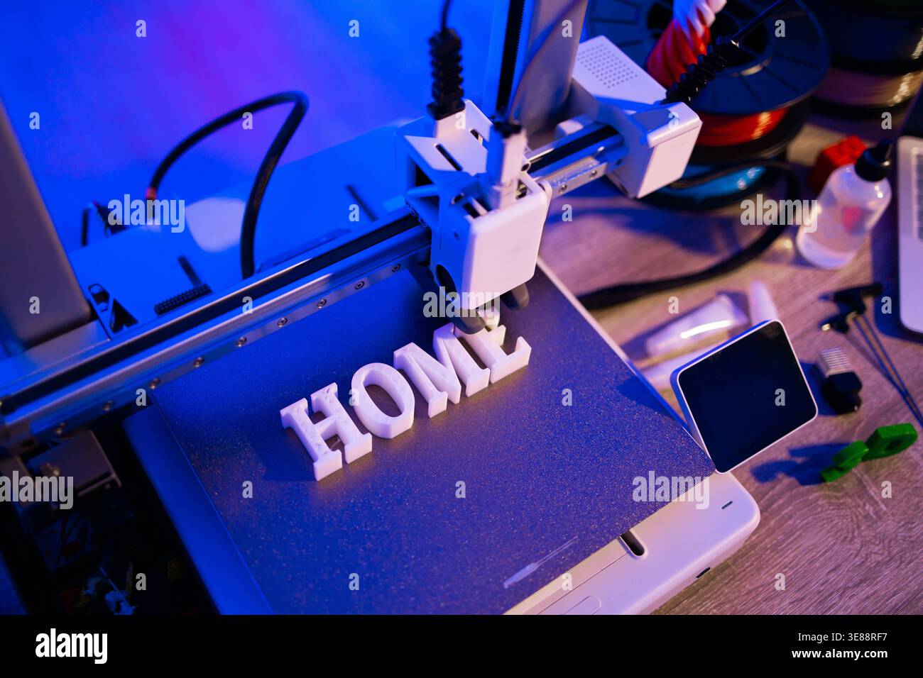3D Printer Creating Word HOME Stock Photo