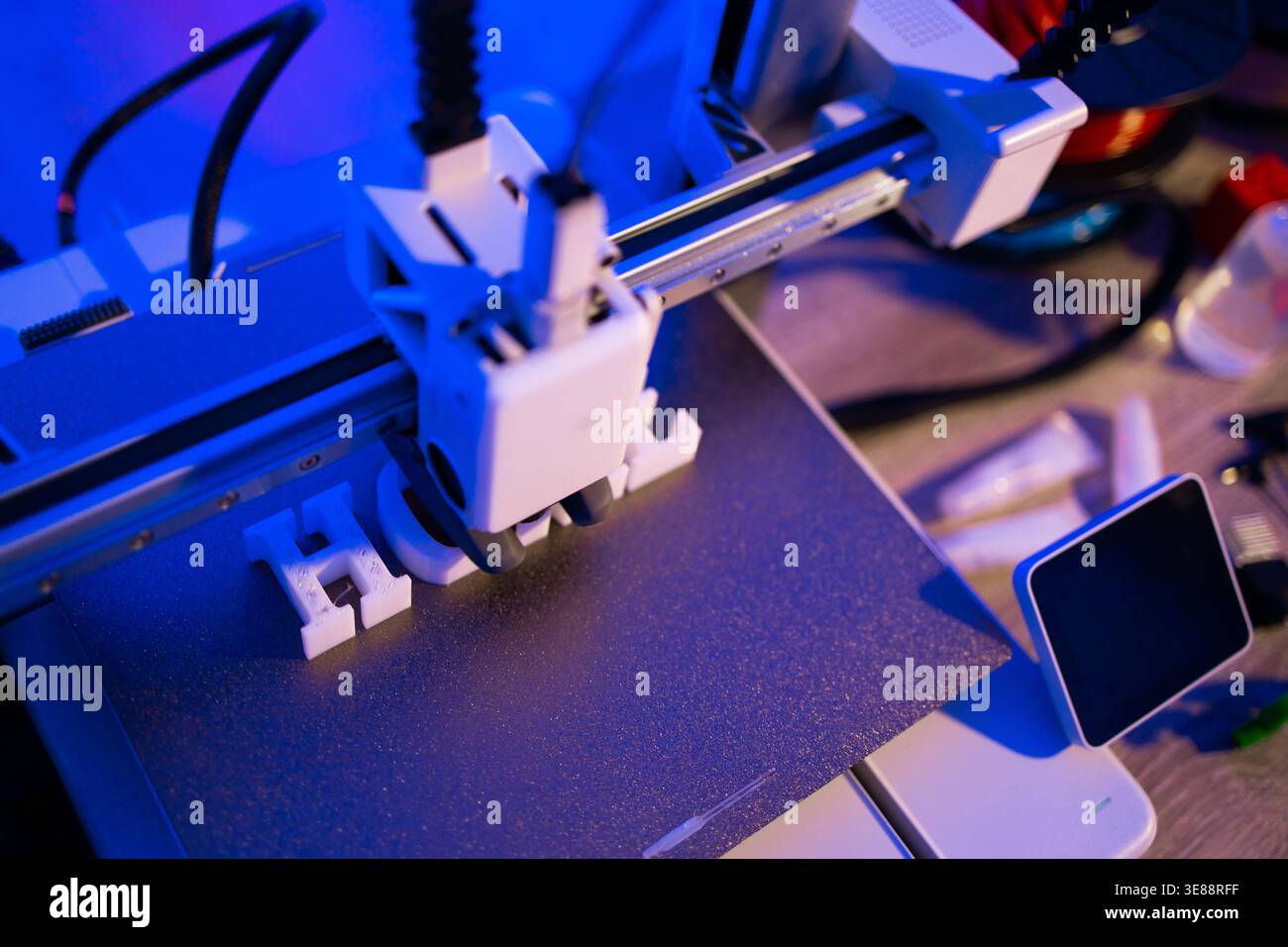 3D Printer Creating Letters Stock Photo