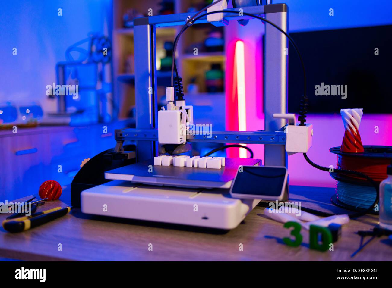 3D Printer Creating Objects Stock Photo