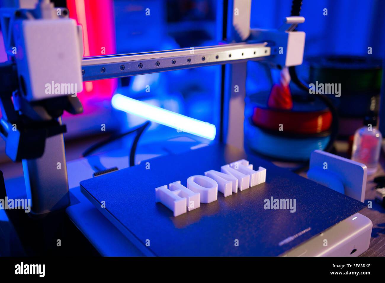 3D Printer Creating Word HOME Stock Photo