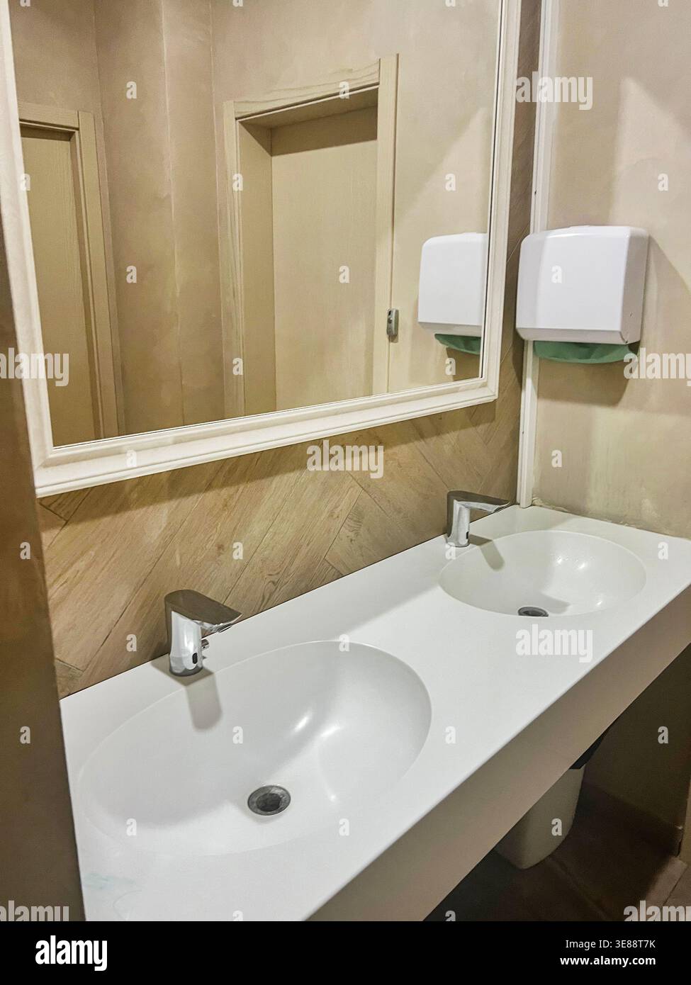 Modern restroom interior with stone gray tiles. interior of public ...