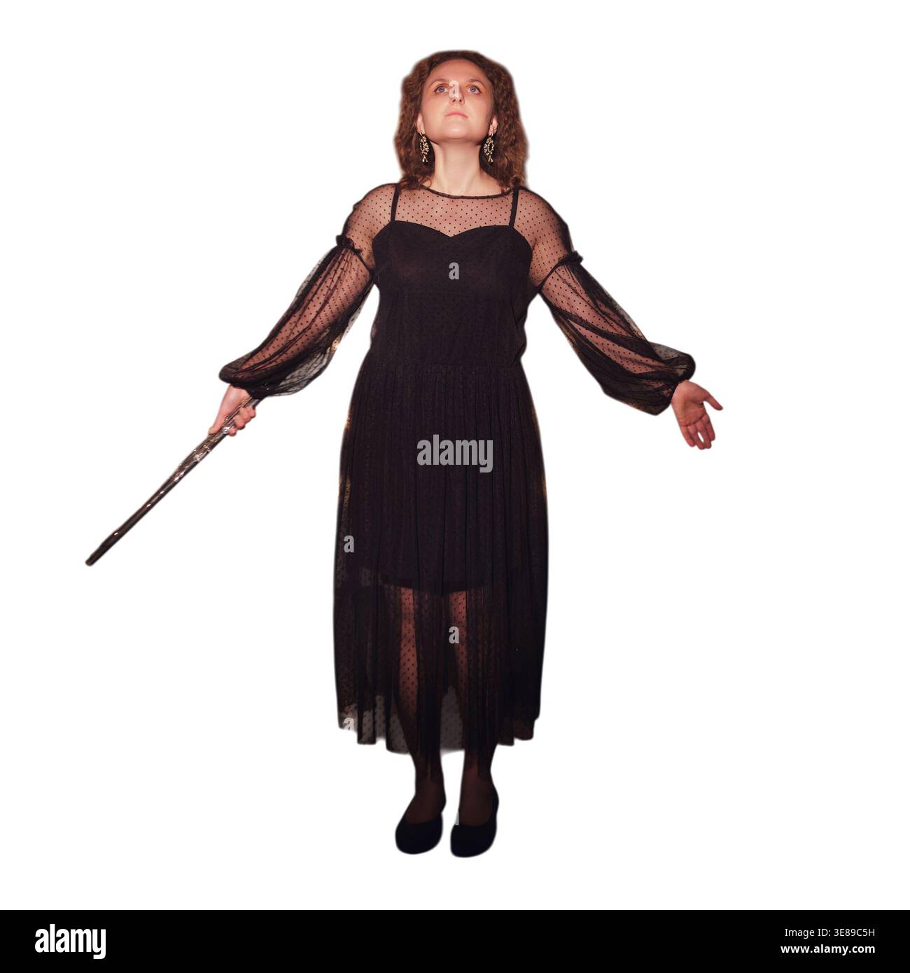 Woman flutist standing in long black dress holding silver flute on isolated white background. Classical musician performing in concert attire. Elegant Stock Photo - Alamy Woman flutist standing in long black dress holding silver flute on isolated white background. Classical musician performing in concert attire. Elegant Stock Photo - Alamy