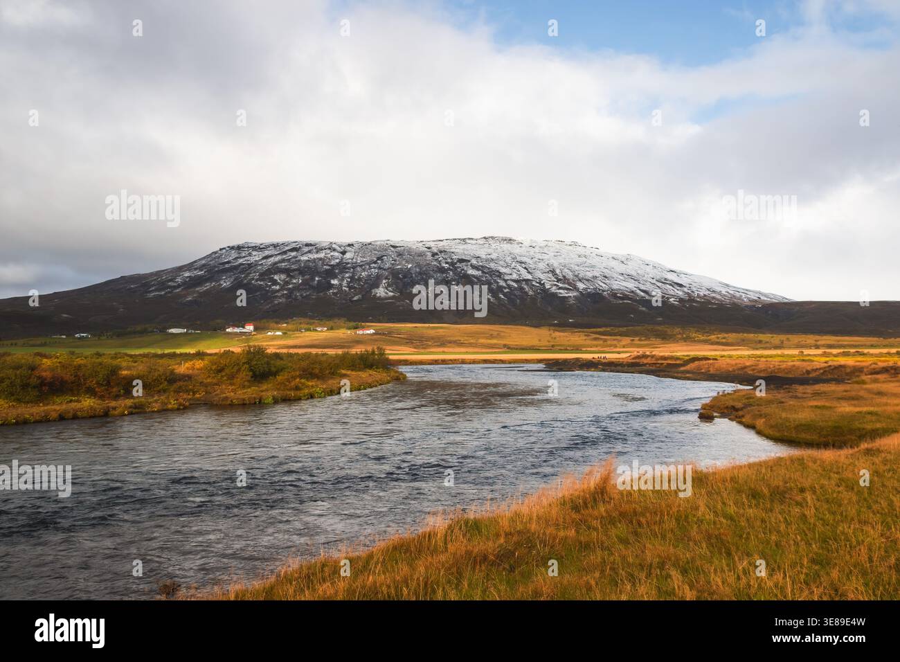 Landscape with river Brúará and snowy mountains in Iceland Stock Photo