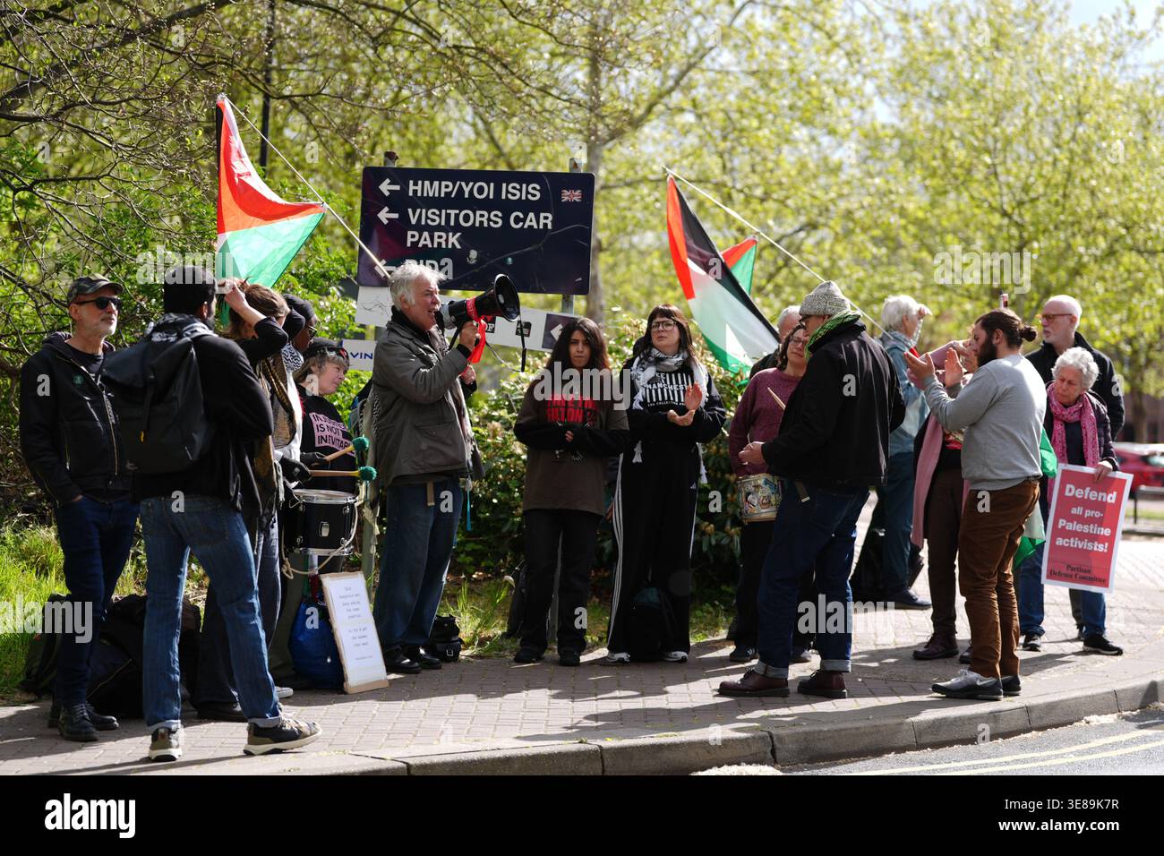 People taking part in a protest outside Woolwich Crown Court, London ...