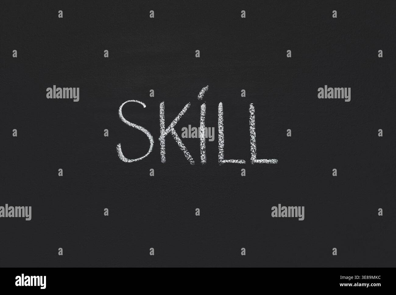 Word Skill written with white chalk on blackboard Stock Photo