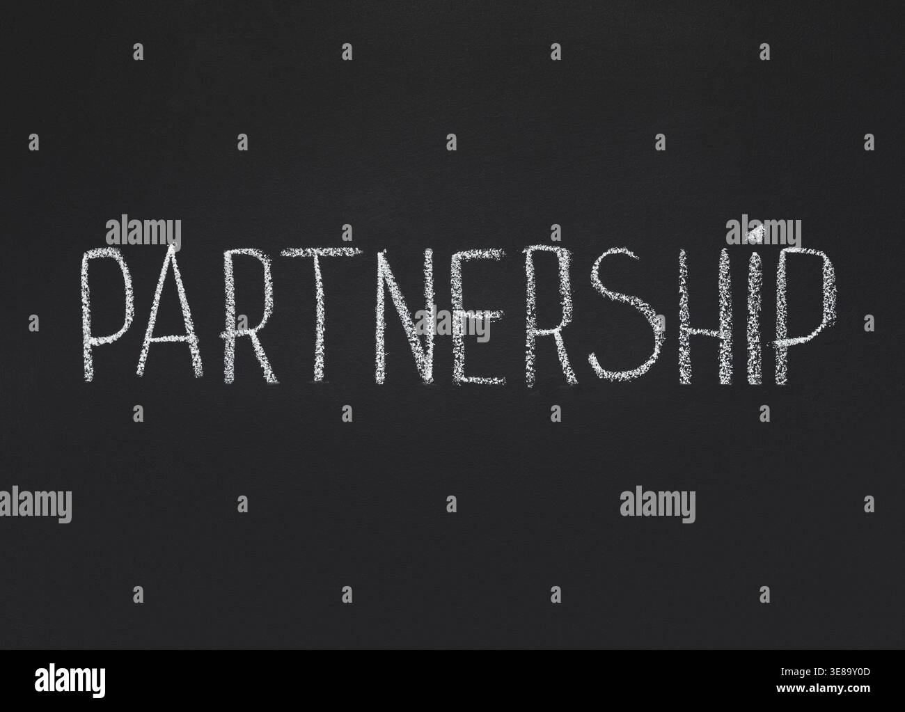 Partnership word written on chalkboard, copy space Stock Photo