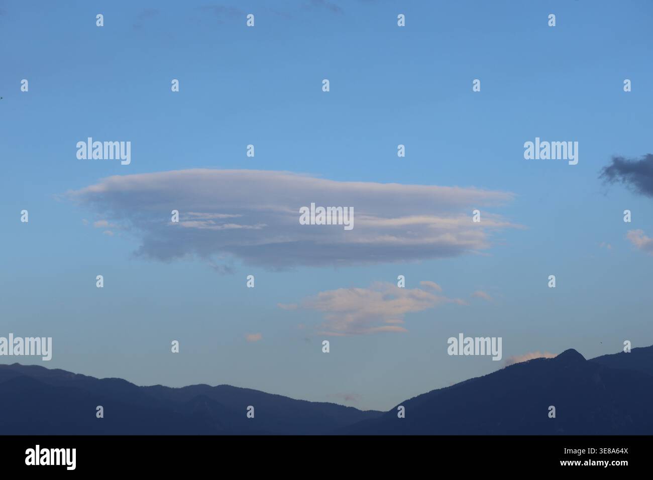 Rare Lenticular Cloud Formation in the sky Stock Photo