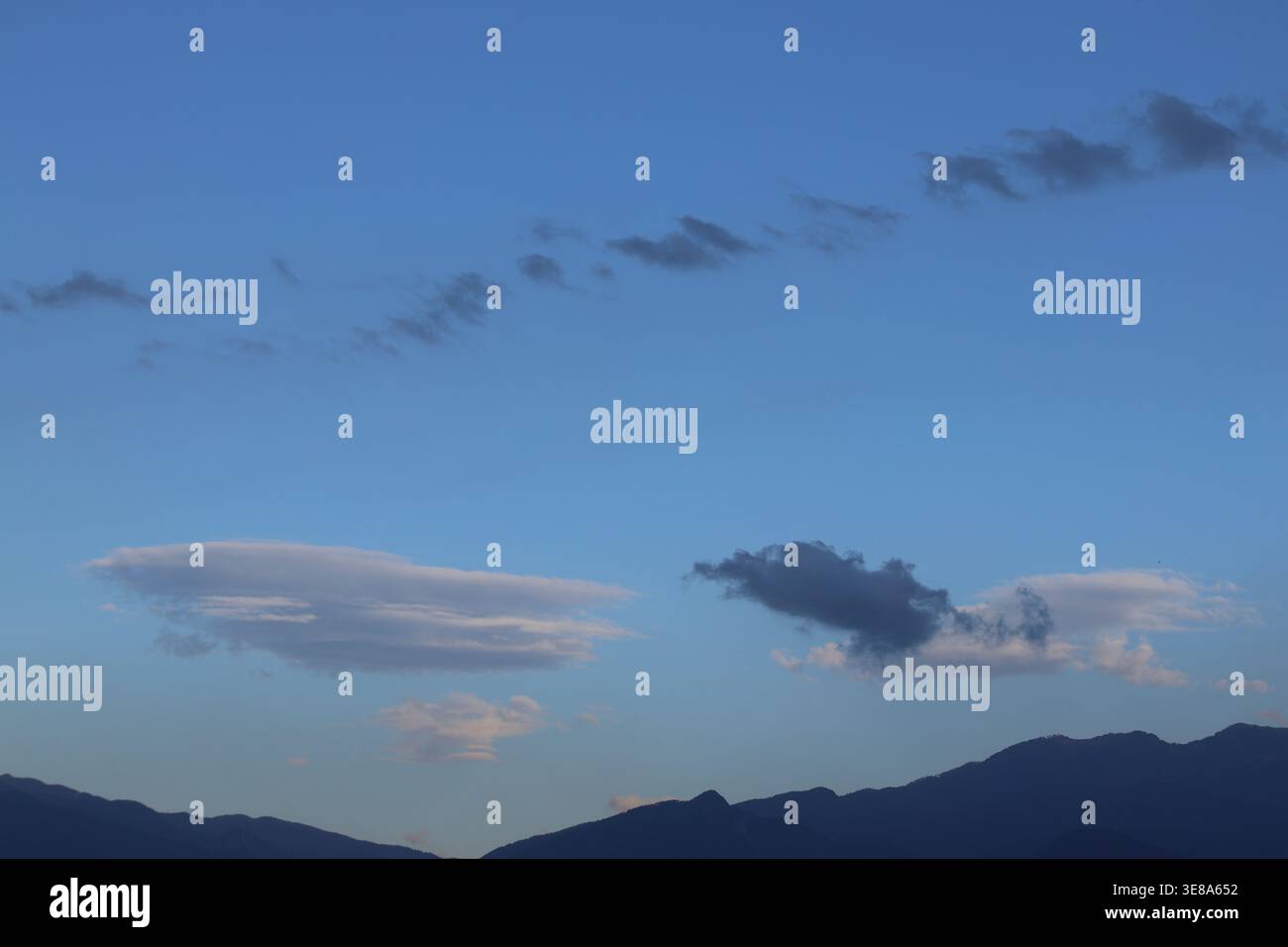 Rare Lenticular Cloud Formation in the sky Stock Photo