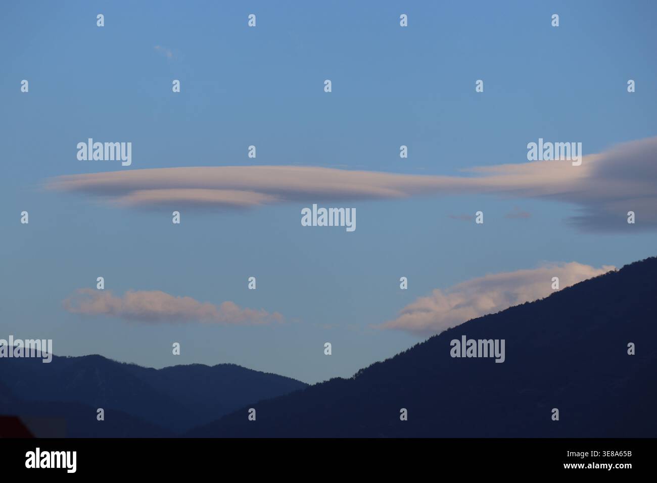 Rare Lenticular Cloud Formation in the sky Stock Photo