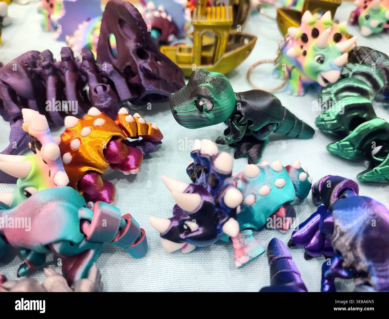 3D printed different art objects. Objects printed on 3D printer from melted colored plastic. Multicolored models created on 3D printer from threads of molten plastic. Modern new additive technologies Stock Photo