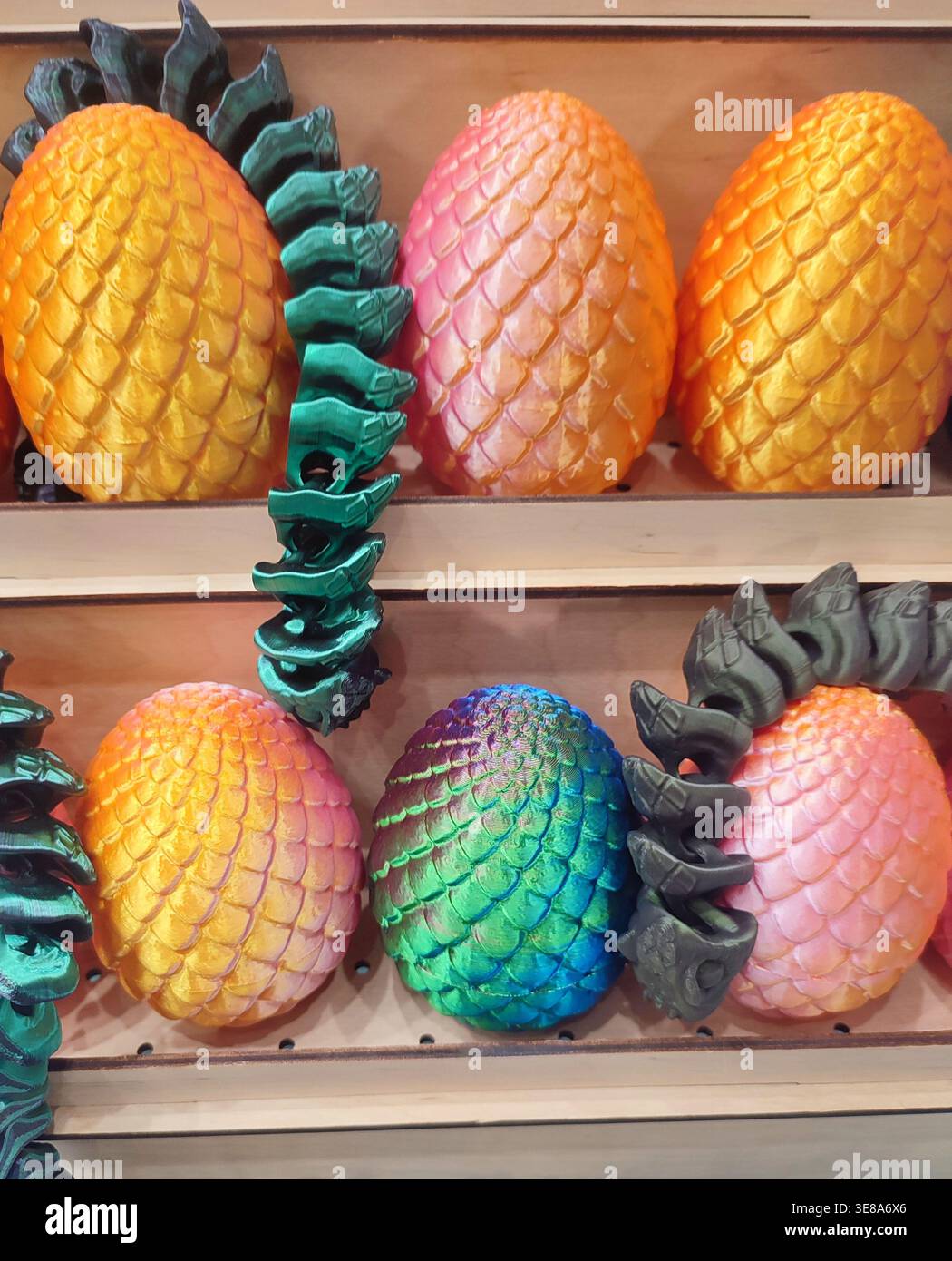 3D printed different art objects. Objects printed on 3D printer from melted colored plastic. Multicolored models created on 3D printer from threads of molten plastic. Modern new additive technologies Stock Photo
