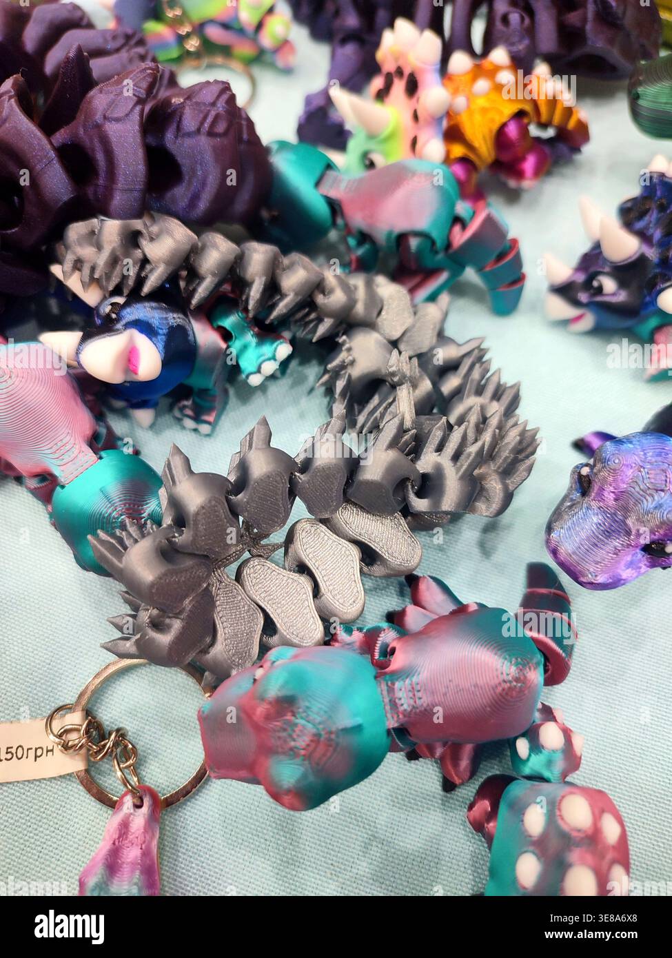 3D printed different art objects. Objects printed on 3D printer from melted colored plastic. Multicolored models created on 3D printer from threads of molten plastic. Modern new additive technologies Stock Photo