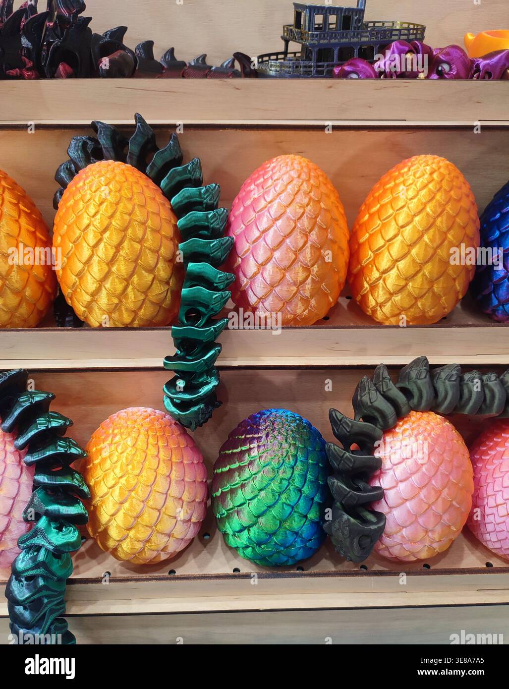 3D printed different art objects. Objects printed on 3D printer from melted colored plastic. Multicolored models created on 3D printer from threads of molten plastic. Modern new additive technologies Stock Photo