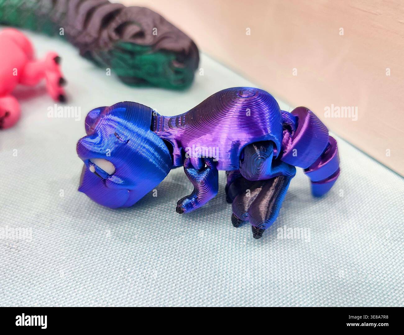 3D printed different art objects. Objects printed on 3D printer from melted colored plastic. Multicolored models created on 3D printer from threads of molten plastic. Modern new additive technologies Stock Photo