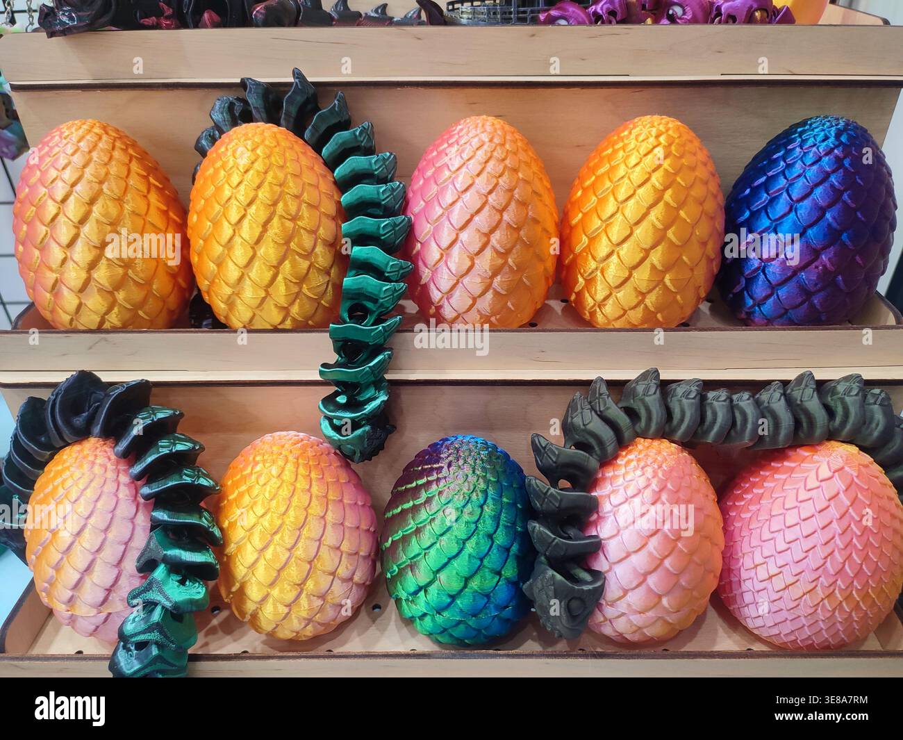 3D printed different art objects. Objects printed on 3D printer from melted colored plastic. Multicolored models created on 3D printer from threads of molten plastic. Modern new additive technologies Stock Photo