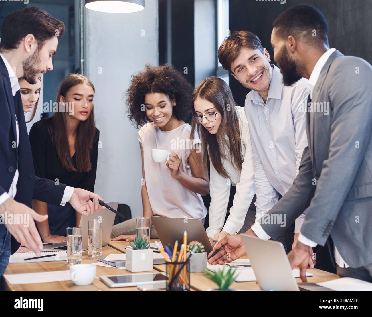 Creative coworkers working with new startup project Stock Photo