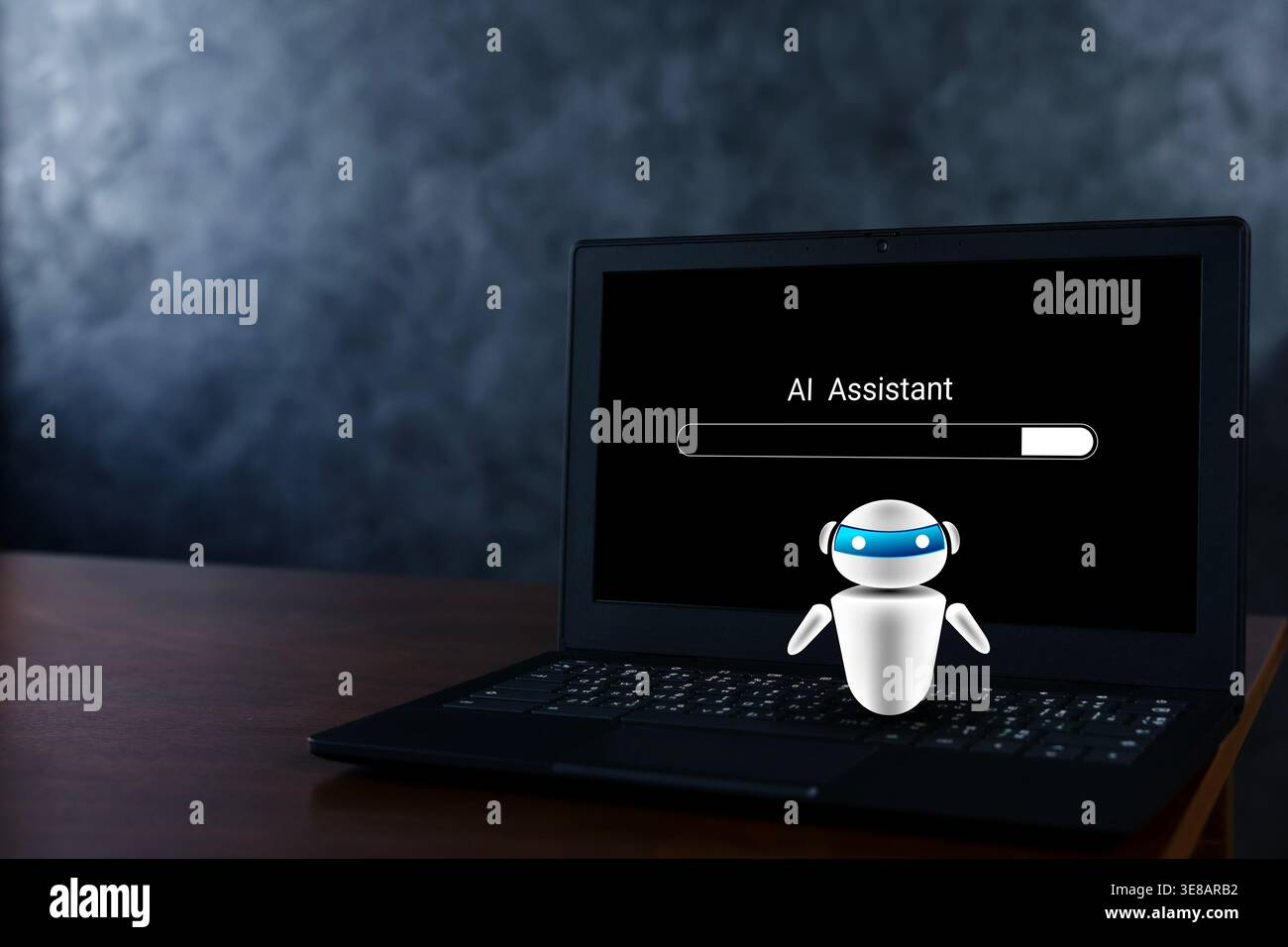 Laptop displaying an AI assistant loading screen with a chatbot robot icon, representing virtual support, automation, software startup, machine learni Stock Photo