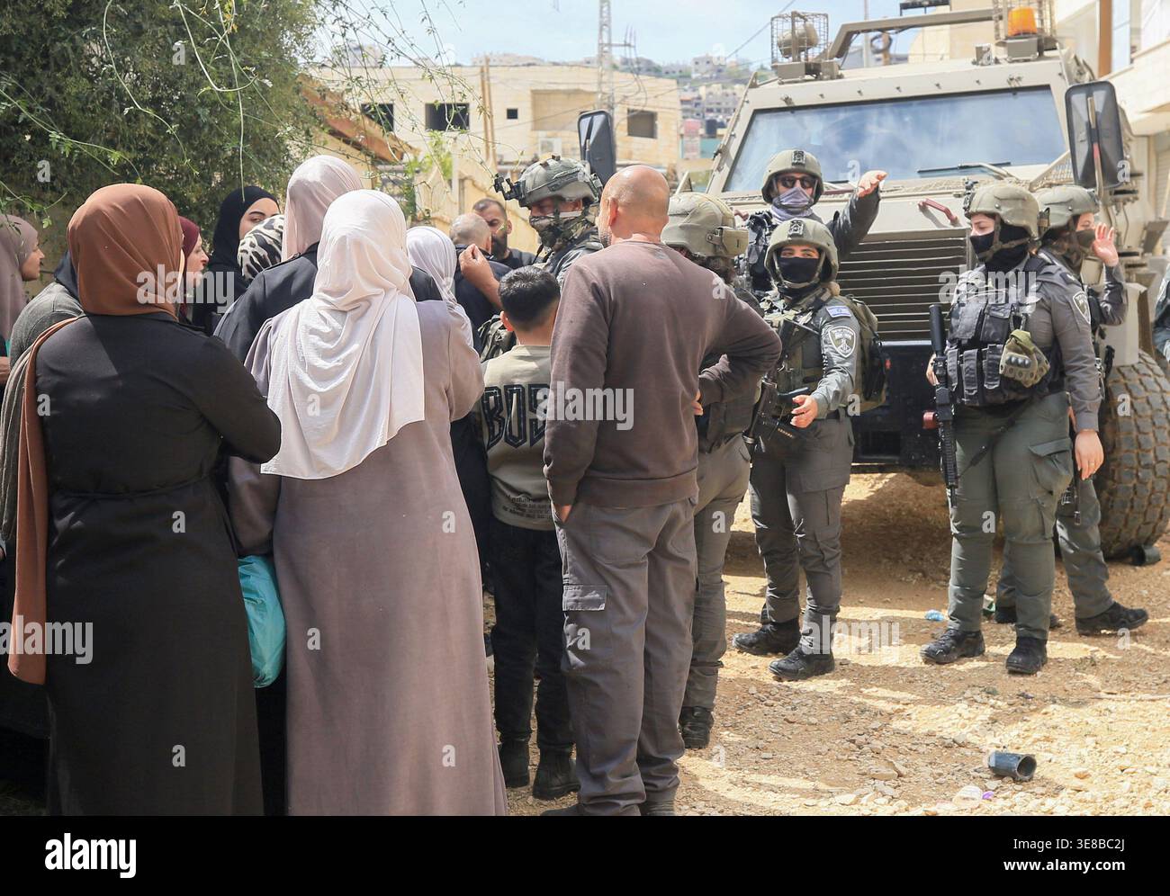 Jenin Checkpoint Palestinians argue with soldiers to try to enter an Israeli army ...