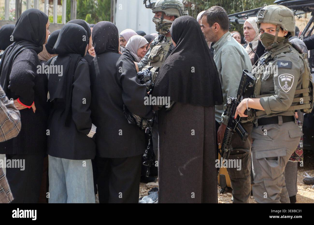 Jenin Checkpoint Palestinians argue with soldiers to try to enter an Israeli army ...