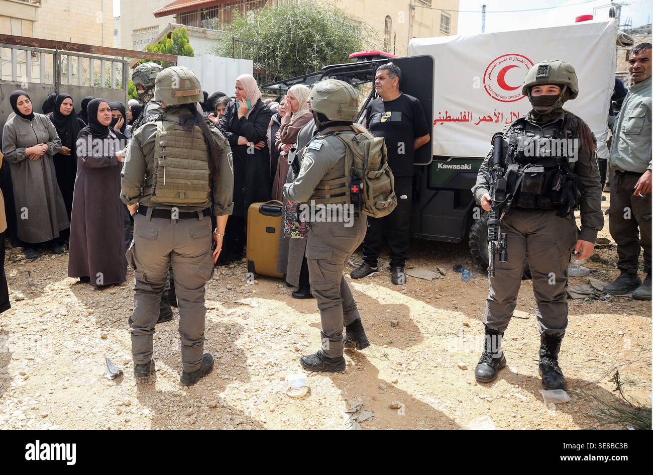 Jenin Checkpoint Palestinian families wait at an Israeli army checkpoint at the entrance ...