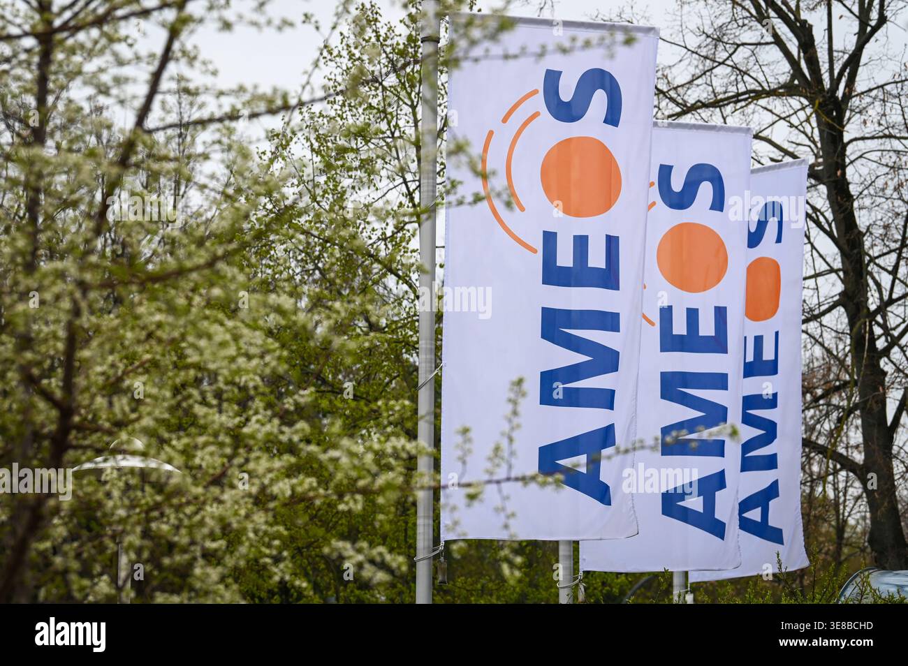 13 April 2026, Saxony-Anhalt, Aschersleben: Flags with the Ameos logo ...