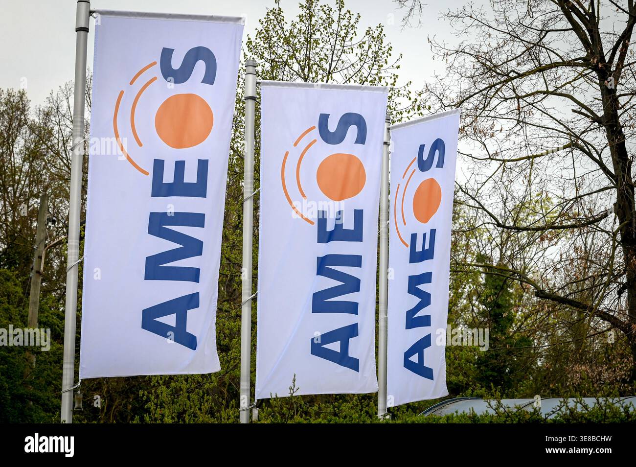 13 April 2026, Saxony-Anhalt, Aschersleben: Flags with the Ameos logo ...