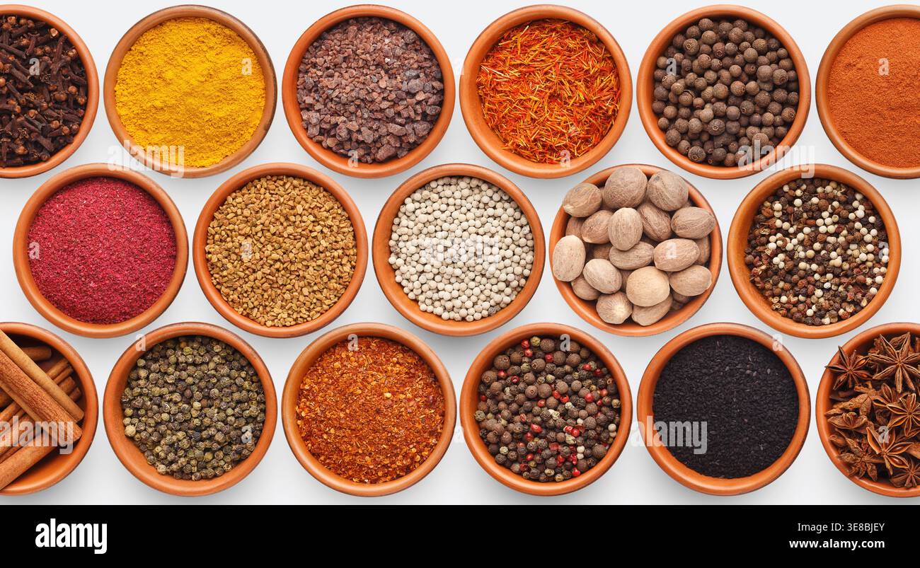 Different kinds of spices on white background Stock Photo