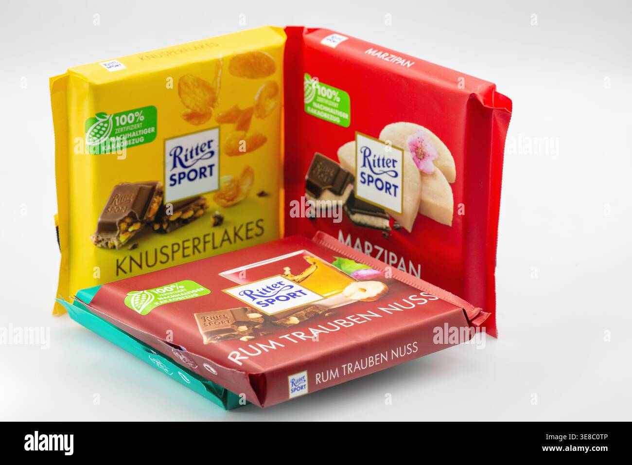 Kyiv, Ukraine - January 28, 2026: Ritter Sport chocolate bars in different flavors including marzipan and nuts. Bright packaging closeup on white, con Stock Photo
