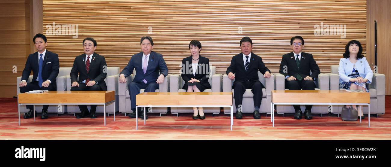 Japanese Prime Minister Sanae Takaichi (C) attends a cabinet meeting at ...