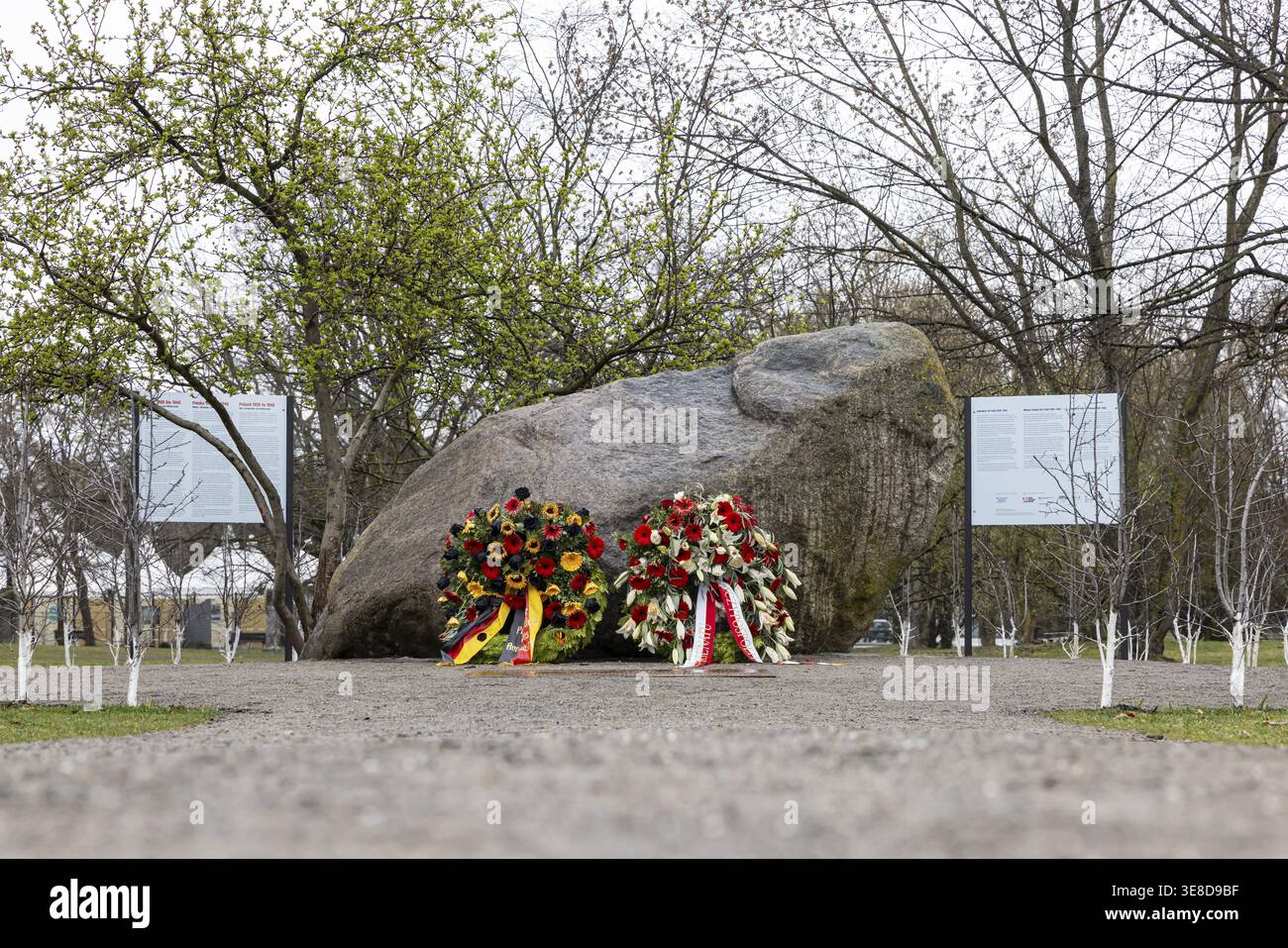 Memorial stone for Poland 1939â€”1945. The memorial is located in a historically symbolic location, the site of the former Kroll Opera, where Adolf Hi Stock Photo