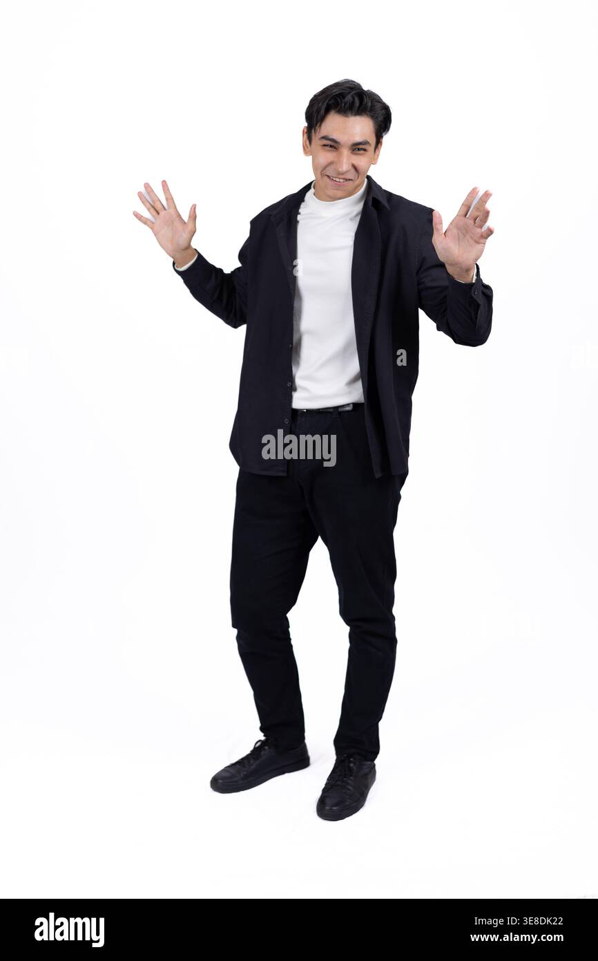 Excited man shouting and calling out on white background Stock Photo