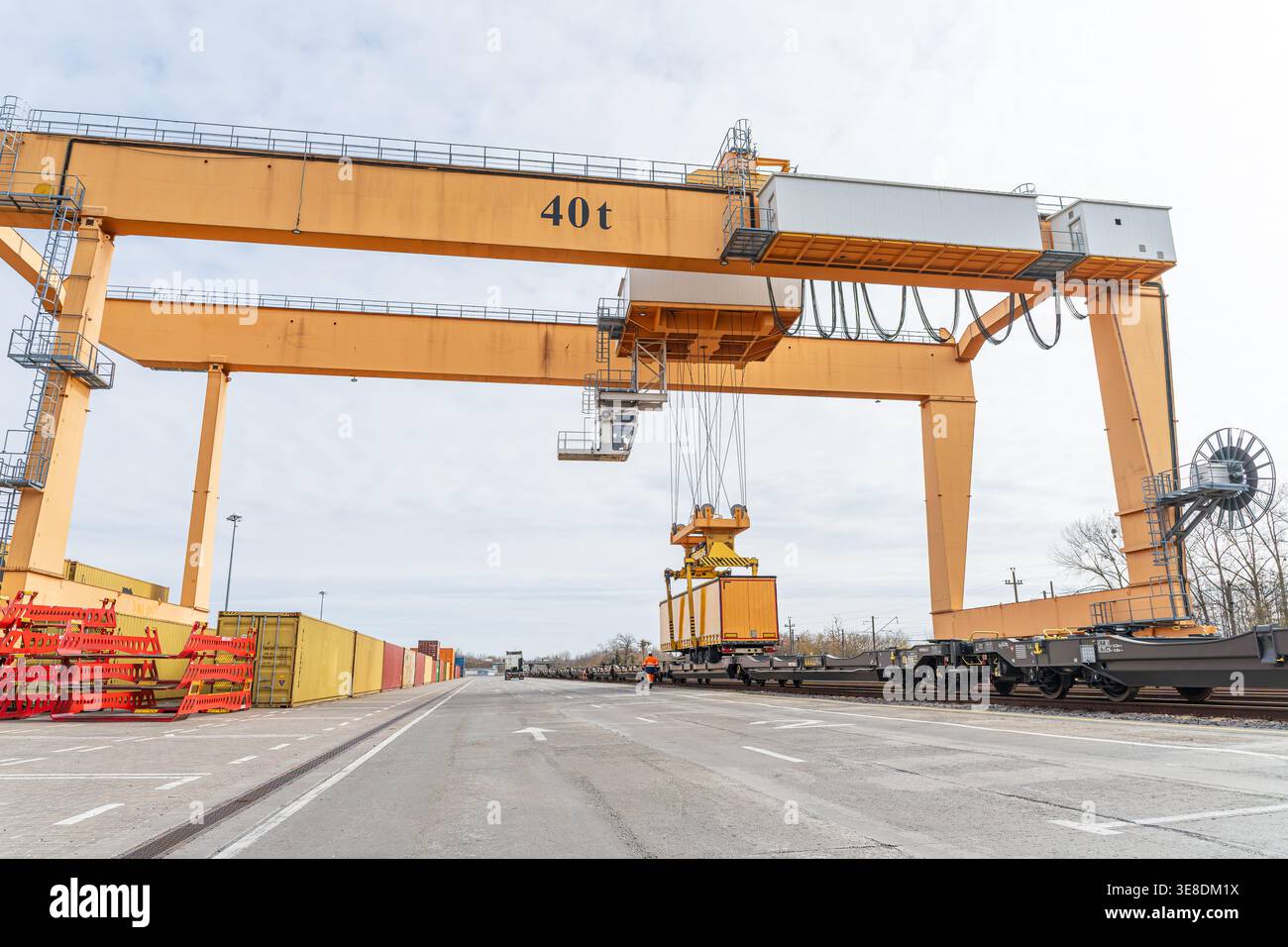Large gantry crane operating at an intermodal logistics terminal ...