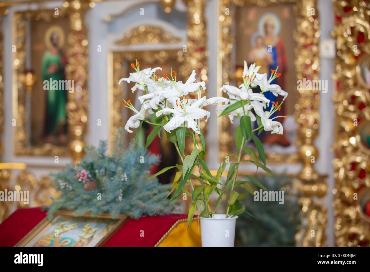 White lilies church hi-res stock photography and images - Alamy