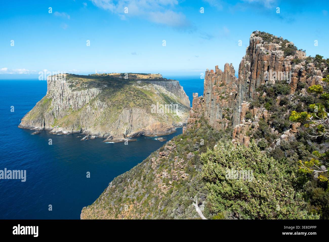 A lone hiker atop of The Blade, Three Capes Track, Tasman Peninsula, Tasmania, Australia Stock Photo