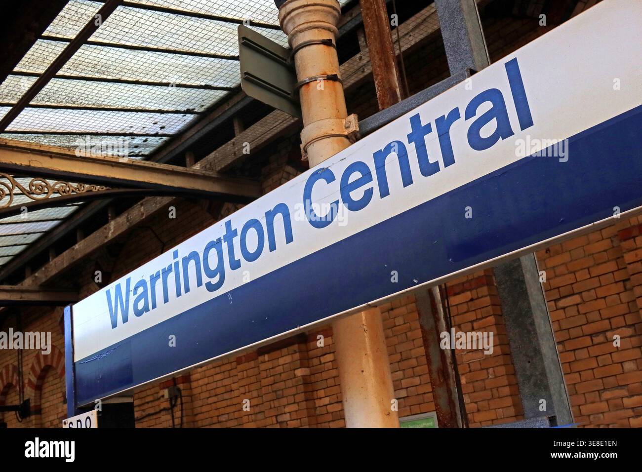 Warrington Central railway station sign on the platform at the Northern-managed station on Winwick Street. Stock Photo