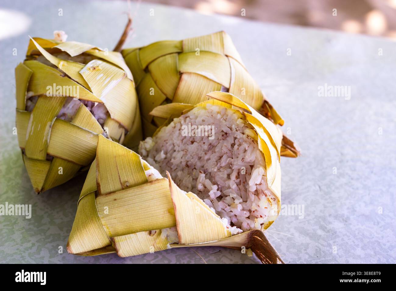 Hanged Rice Freshly cooked Filipino puso rice, wrapped in coconut leaves. Puso, or ...