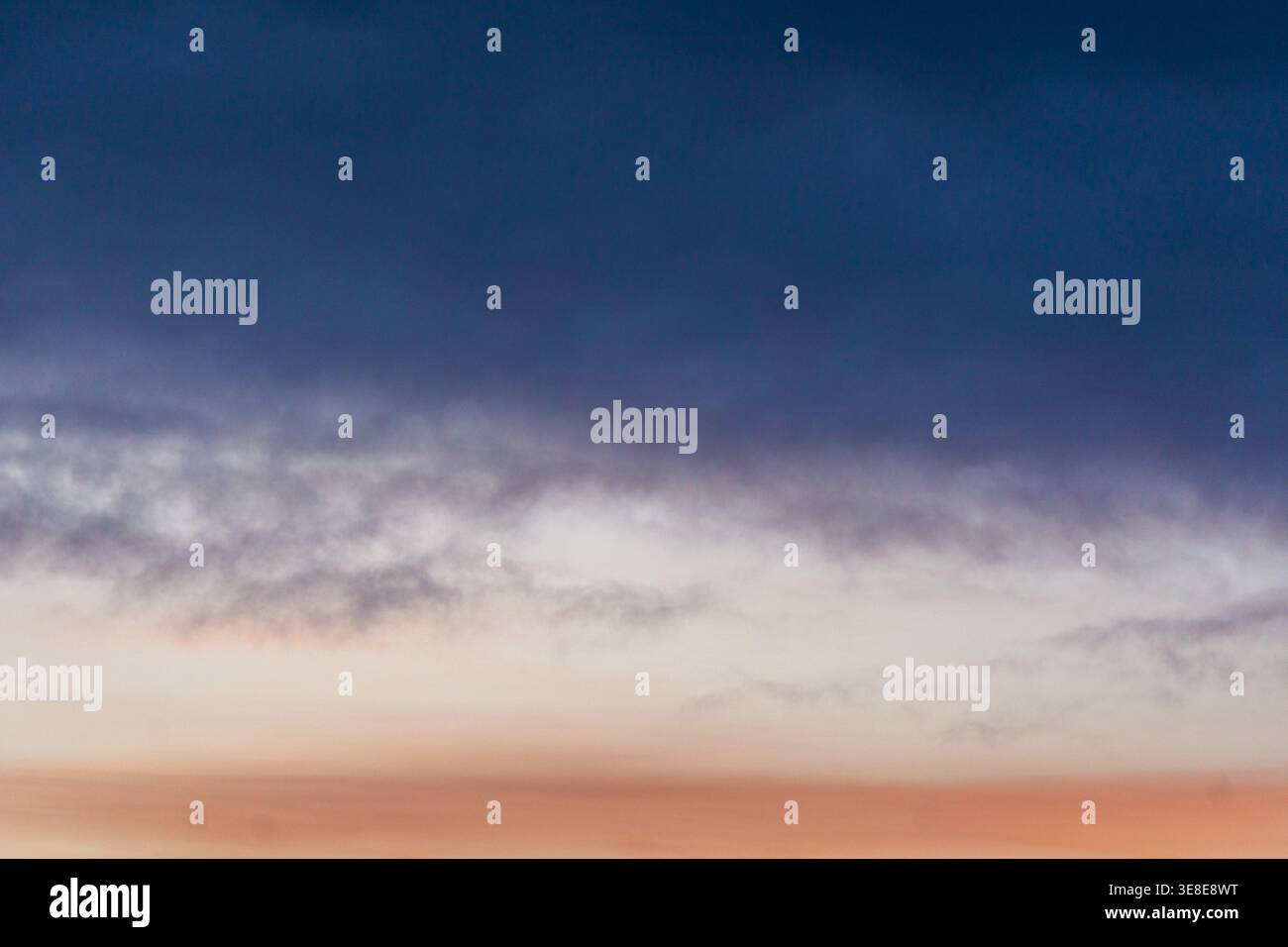 Gradient sky with soft clouds at sunset Stock Photo