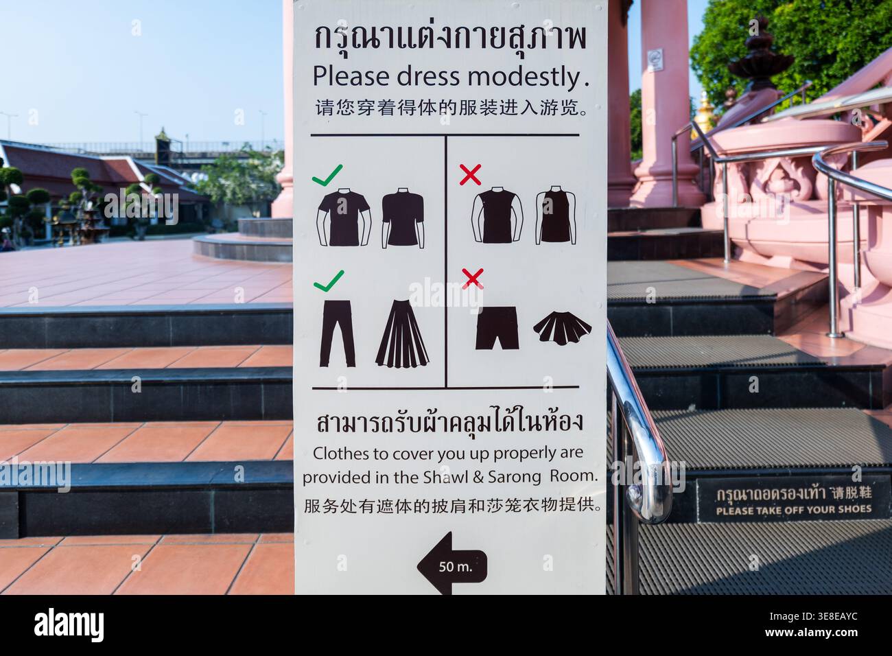 dress-code-for-temples-in-thailand-a-sign-announcing-the-appropriate