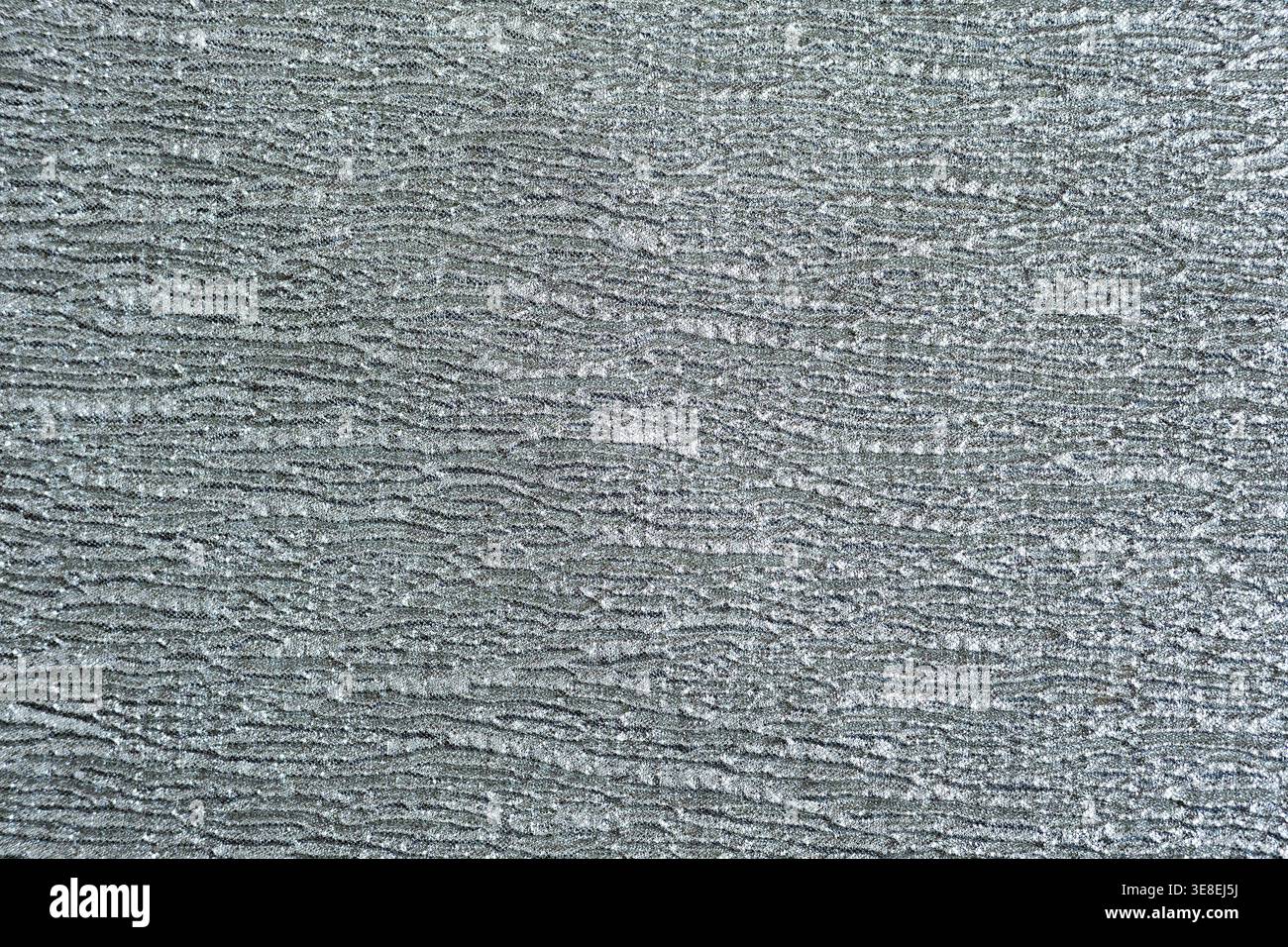 Texture of shiny silver fabric Stock Photo