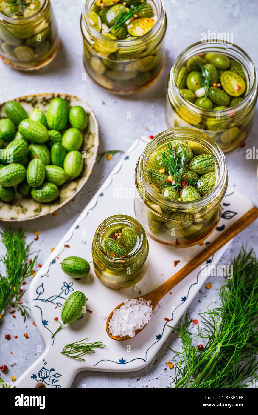 Homemade food: Pickled cucamelons (pickled cucumbers, pickled gherkins), grown in a organic garden Stock Photo