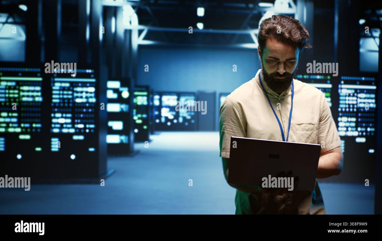 Engineer in cryptocurrency server farm with specialized hardware using Blockchain technology for crypto mining. Fintech specialist using asic rigs to solve complex computational problems Stock Photo