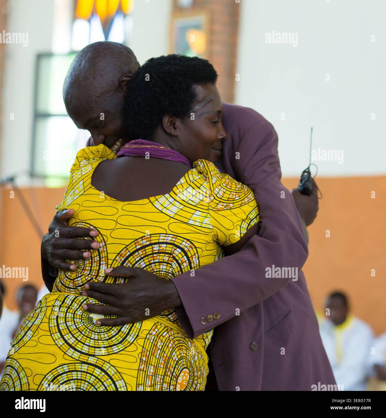 A survivor of the 1994 Genocide against the Tutsi grants forgiveness to a perpetrator responsible for killing her family in Bugesera District, Rwanda Stock Photo
