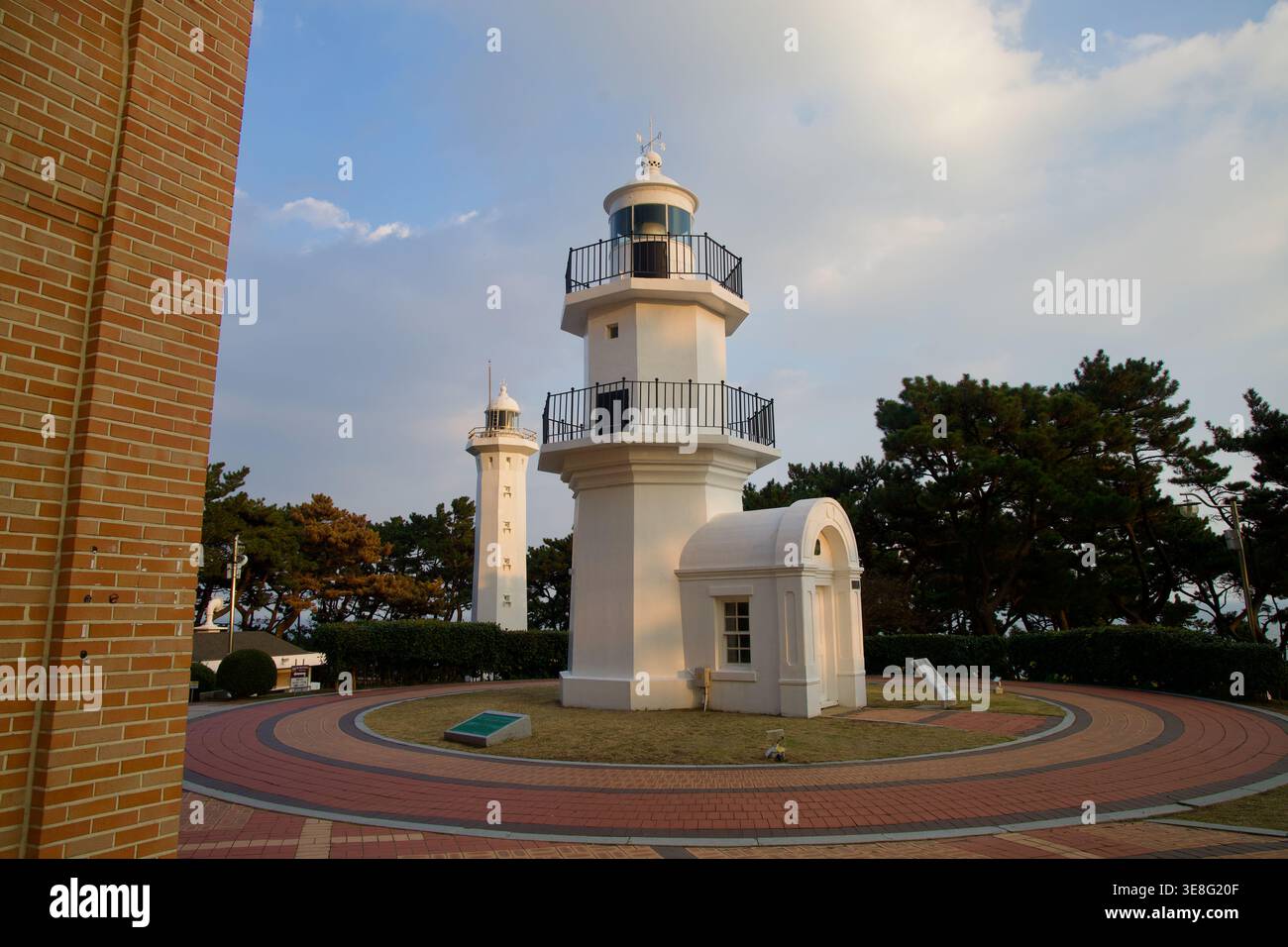 Two lighthouse structures stand at Ulgi Lighthouse in Ulsan, with a ...