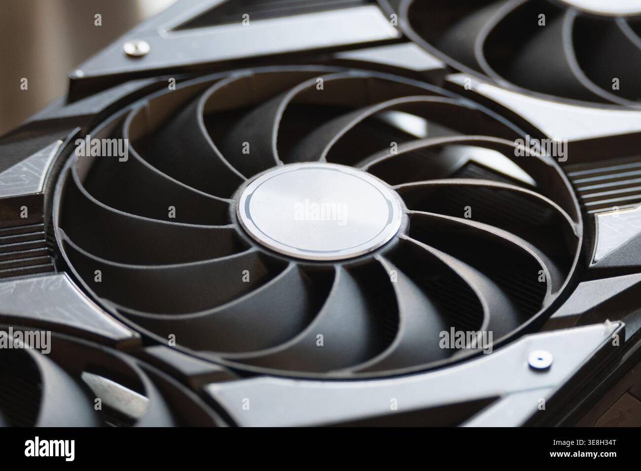 Graphics card cooling fan close up computer hardware gaming technology concept for performance computing data processing and modern electronics indust Stock Photo