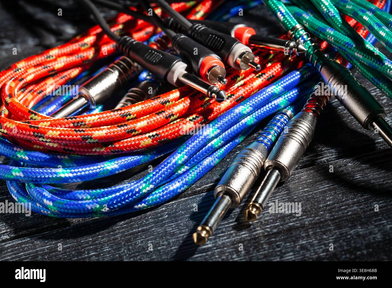 rca ts audio cable on black wood background Stock Photo