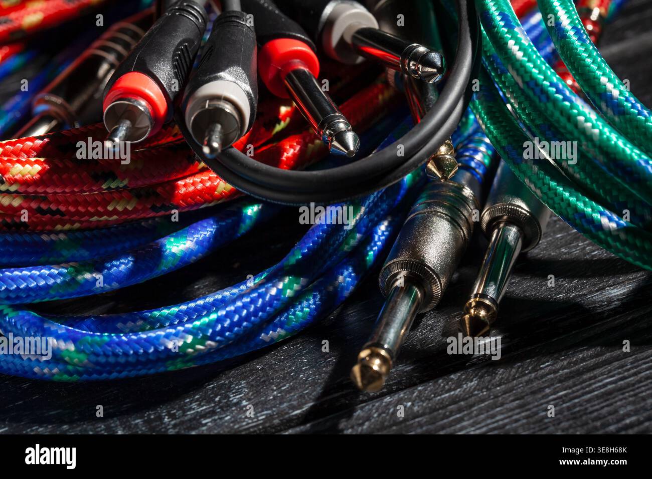 rca ts audio cable on black wood background Stock Photo