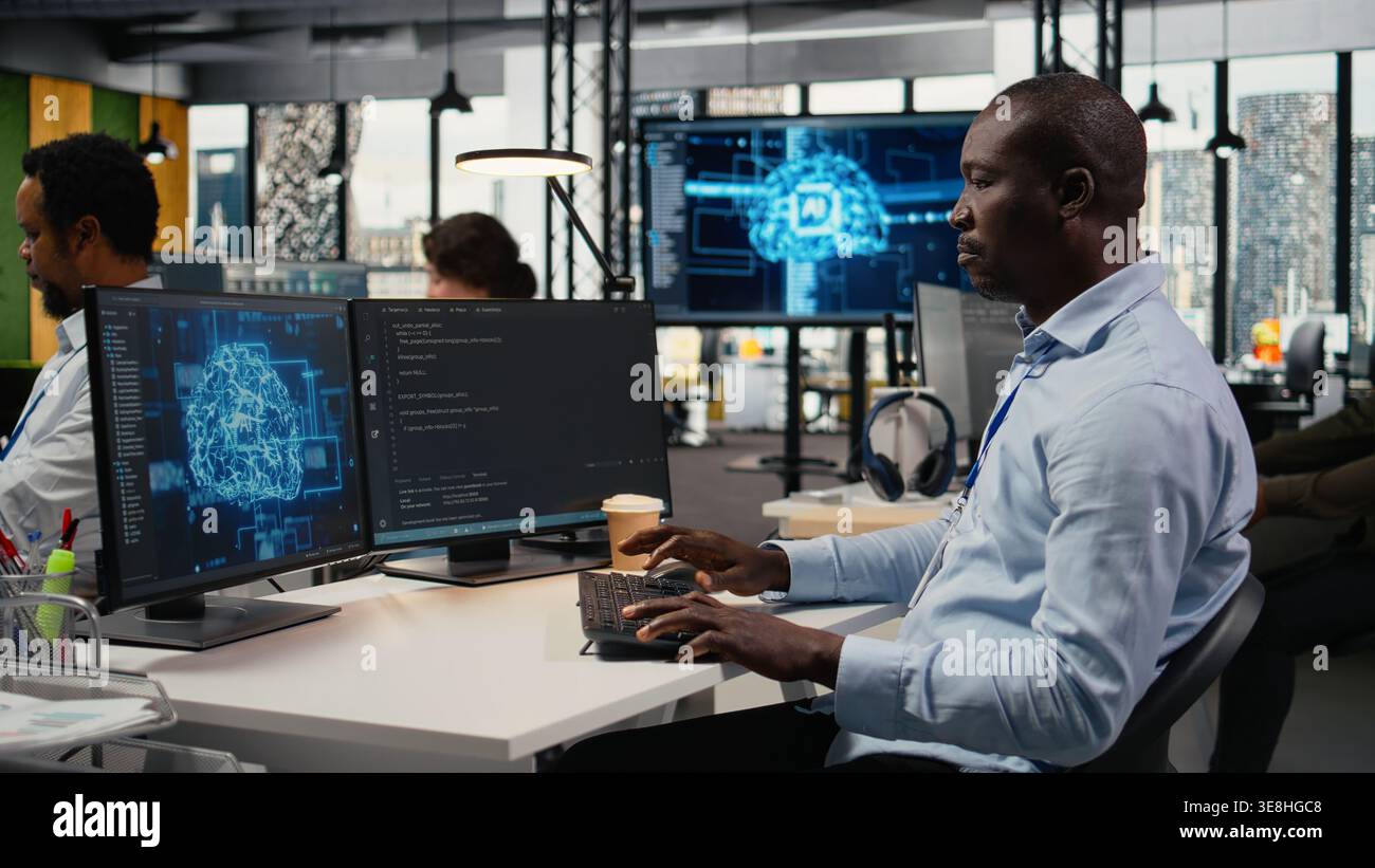 Software developers in startup office work with artificial intelligence driving market innovation. Tech agency IT experts apply deep learning to optimize operations and efficiency, camera A Stock Photo