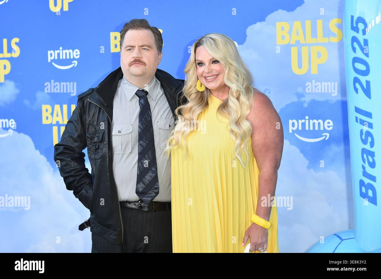 Paul Walter Hauser, left, and Amy Boland Hauser arrive at the premiere ...