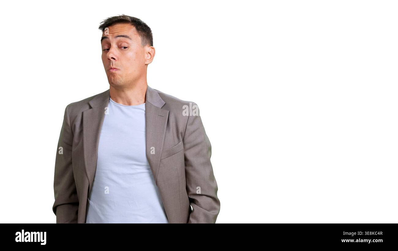Man expressing skepticism with doubtful facial expression Stock Photo